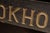Antique Hand-Carved "Bookhout Funeral Home" Painted Wood Sign For Sale - Image 10 of 15