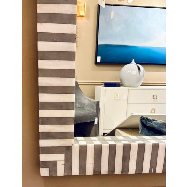 Original retail $1780, stylish Made Goods Modern Faux White Bone Jonah Wall Mirror, gray resin, showroom floor sample