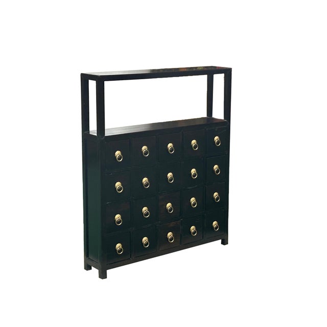 Elevate your interior space with this exquisite vintage Asian table top chest, a masterpiece of traditional craftsmanship...
