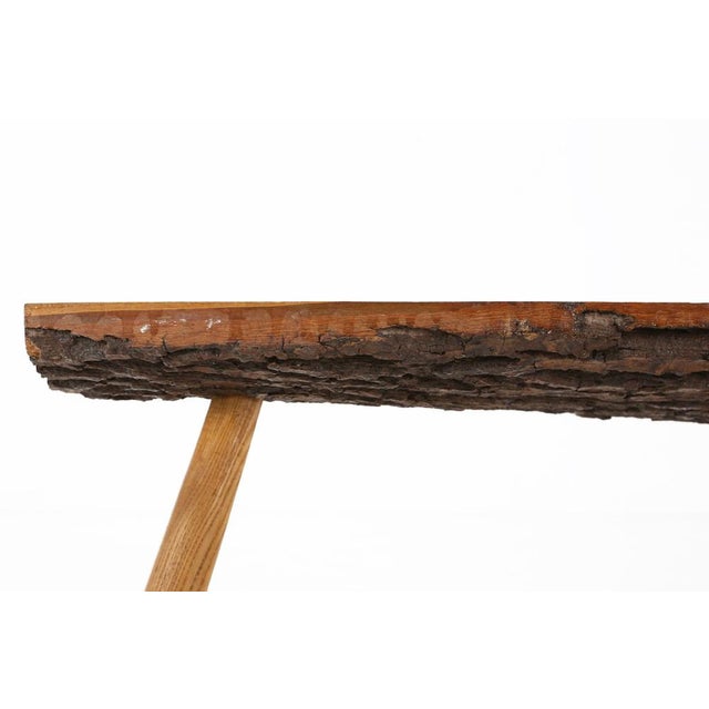Solid tree trunk coffee table made in the 1950's