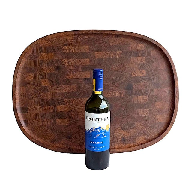 Offered is a staved Teak wood extra-large charcuterie board / tray designed by Jens H. Quistgaard for Dansk. It is made...