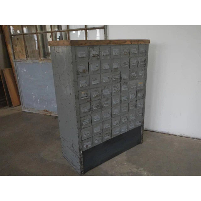 The cabinet is equipped with 56 drawers.