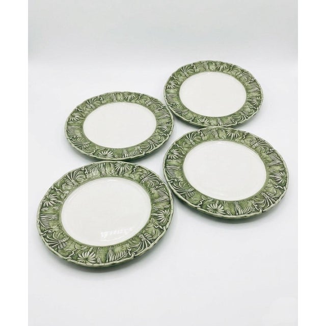 Exuding the effortless sophistication of a sun-drenched Mediterranean estate, this exquisite set of four hand-painted...