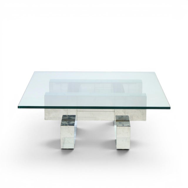 Paul Evans Cityscape Mid Century Chrome and Stainless Steel Coffee Table This coffee table measures: 42 wide x 42 deep x...
