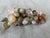 Vintage natural mixed polished gemstone grape cluster accented with a small single brass leaf. A rainbow of muted...