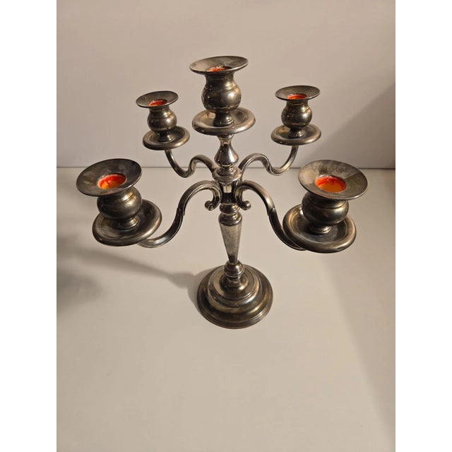 Add a touch of elegance and drama with this vintage silver plate candelabra. The original patina has been preserved but it...