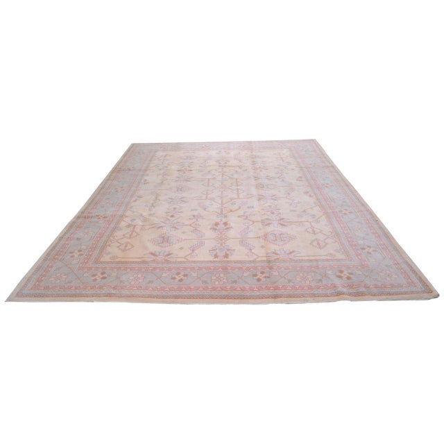 Hand-knotted with care using traditional rug-making techniques, this wool rug blends timeless craftsmanship with a modern...