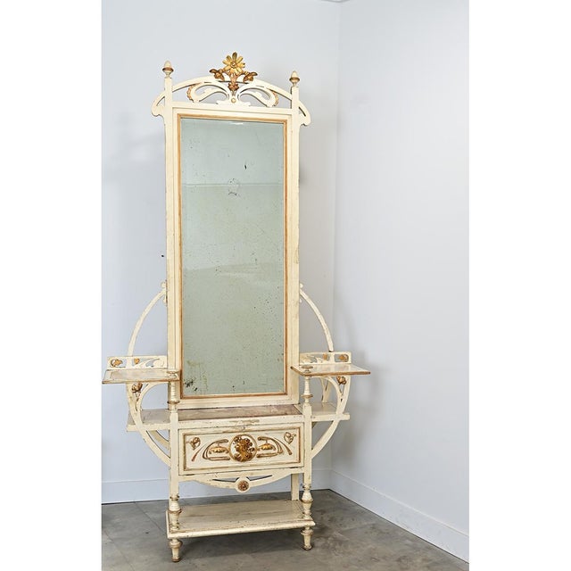 An extraordinary French 19th century vanity or hall tree that could serve many functions around the home to anchor an...