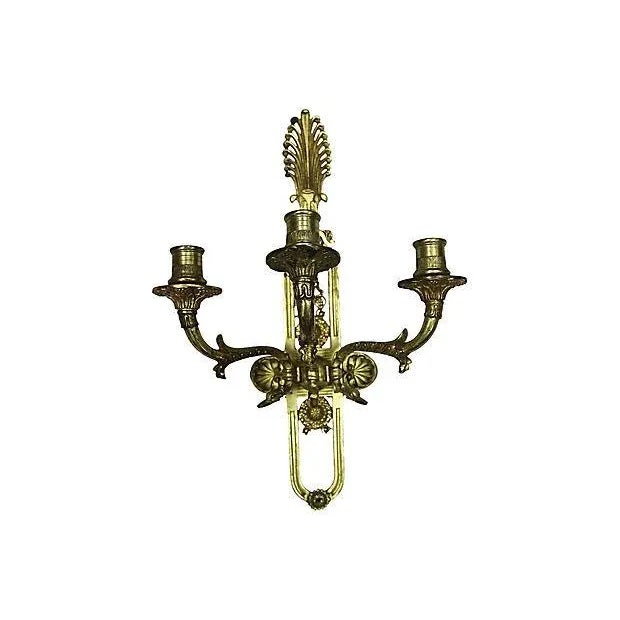 19th Century French brass triple-arm sconce. Predrilled holes for mounting. Hardware not included. No maker's mark. Light...