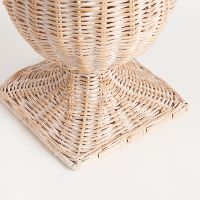 Woven in the form of a classical ceramic urn, this statuesque natural vessel is made of Lesles rattan. An upscale, durable...