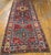 Antique Caucasian Red 1890s Hallway Runner, Circa Date: 1890s. This exceptional example of Caucasian weaving captures the...