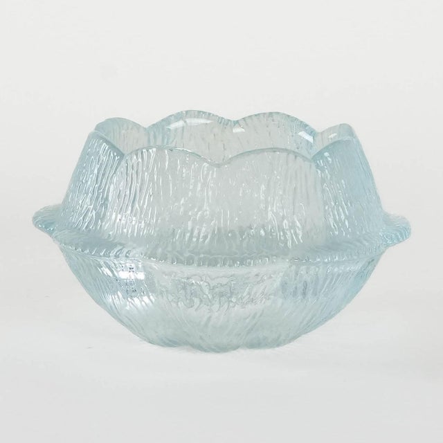 A glass bowl manufactured in the 1980s by the renowned Danish manufacturer Holmegaard. Designed by Sidse Werner. An...