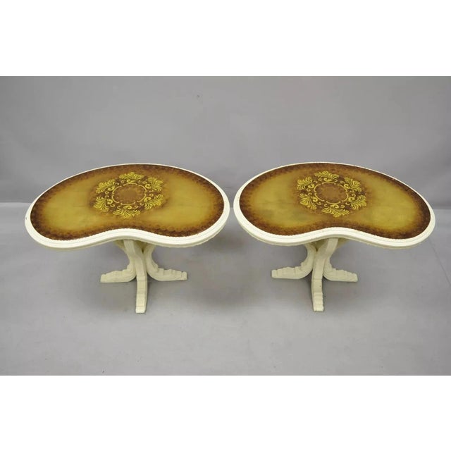Vintage Hollywood Regency Gold Leaf Glass Kidney Bean Shaped Side Tables - a Pair. Tables feature painted gold leaf glass...