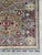 A hand-knotted runner in the Mamluk design, woven in Afghanistan on a soft teal ground with olive-gold medallions, crimson...