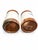 Charming 1970s vintage salt and pepper shakers featuring white ceramic handled bodies, blue lettering, and perforated...