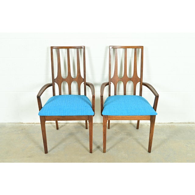 A gorgeous pair of Mid-Century Modern "Brasilia" armchairs or dining captain chairs By Lenoir Chair Company (a subsidiary...
