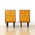 Pair of mid century nightstands made produced in England during the 1960s. Made of Mahogany and maple, they consist of a...