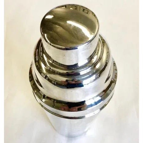 Large, 2 pint capacity, Art Deco Silver Plated Cocktail Shaker. Labeled MADE IN ENGLAND on bottom with a EPNS marking that...