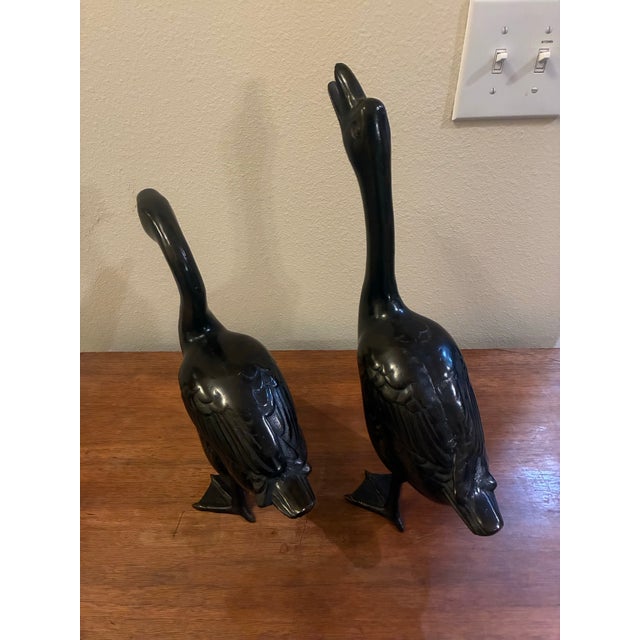 This lovely pair of bronze ducks is the perfect addition to your home or patio. The dimensions for the looking up are...