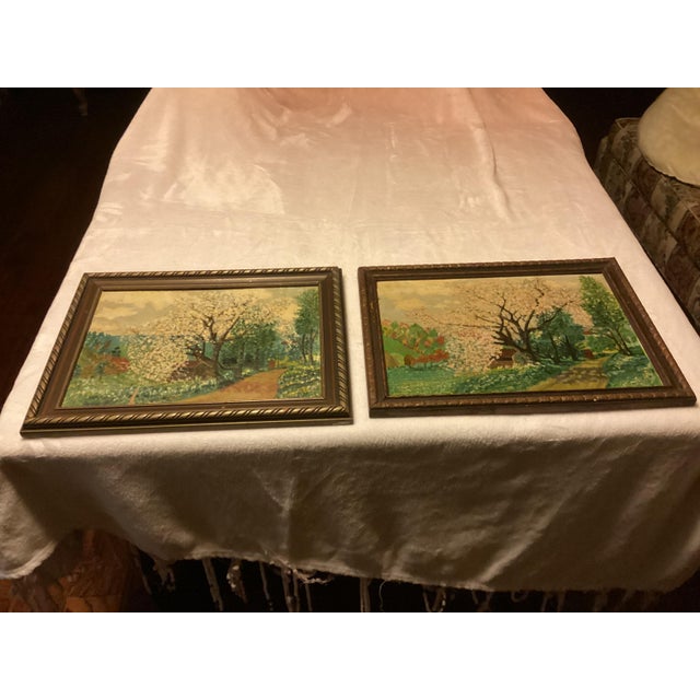 This charming pair of vintage mid-century oil painting captures the essence of a serene countryside in full bloom. Each...