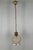 Pendant in Brass and Glass, 1970s, in Very Good conditions. Designed 1970 to 1979 Up to 250V (Europe/UK Standard).The...