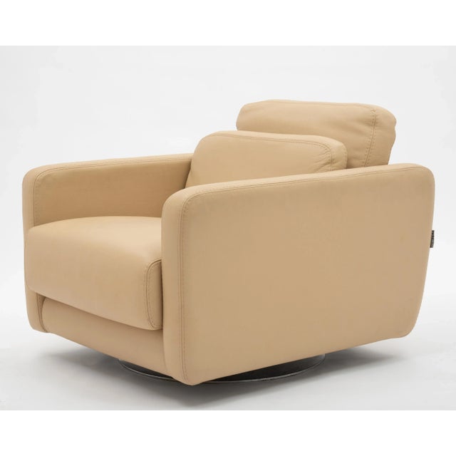 A late 20th Century Roche Bobois swivel leather lounge chair. Beautiful, comfortable and incredibly well made. Fully marked.