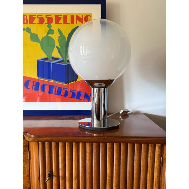 Space age table / floor lamp France 1970s Chromed aluminum base. Glass lampshade 53 cm H x 30 cm diam. Conditions:...