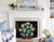 This exquisite vintage hand-painted toleware fireplace screen showcases a charming woven wicker basket with handles...