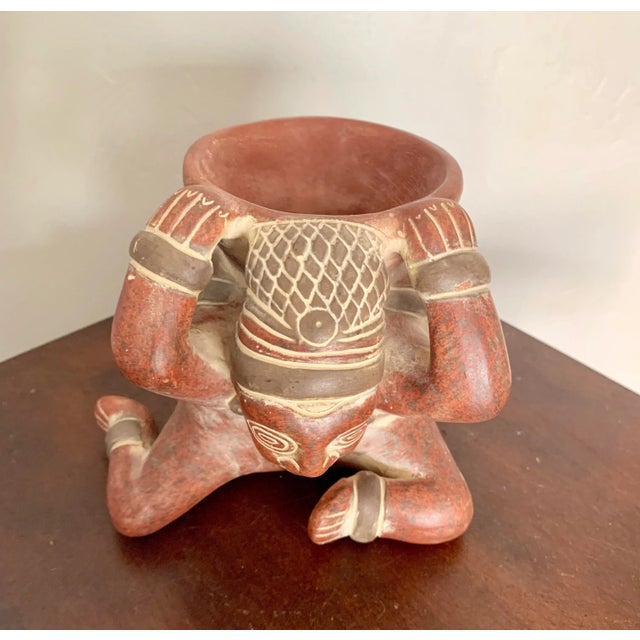 Classic Central American (Pre- Columbian) figural vase Traditional coloring and expression Late 20th Century We found it...