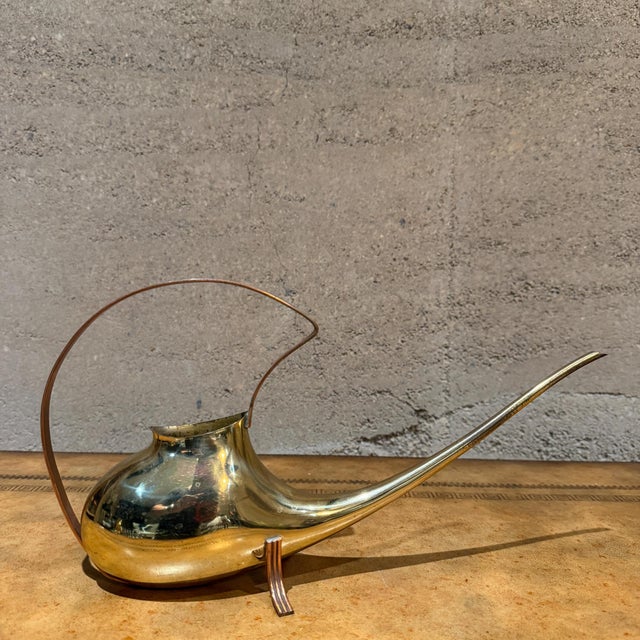 For your consideration, a Vintage Mid-Century Modern (MCM) Brass Watering Can, characterized by its sleek, streamlined...