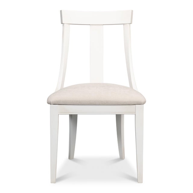 A broad crest rail sweeps gently backward to form the distinctive T-shaped back that Art Deco designers borrowed from...