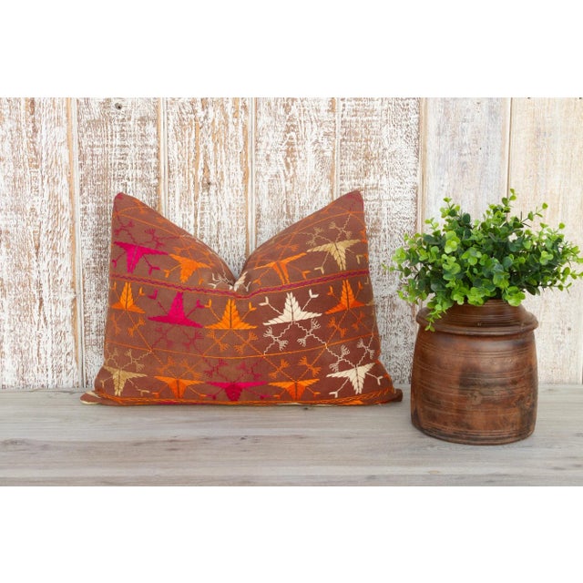 This colorful and luxurious Bagh Phulkari pillow features beautiful hand-done silk embroidery on top of a cotton fabric....