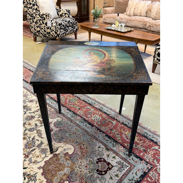 An exquisite 19th-century French ladies writing desk distinguished by its elaborate Chinoiserie-inspired decoration and...