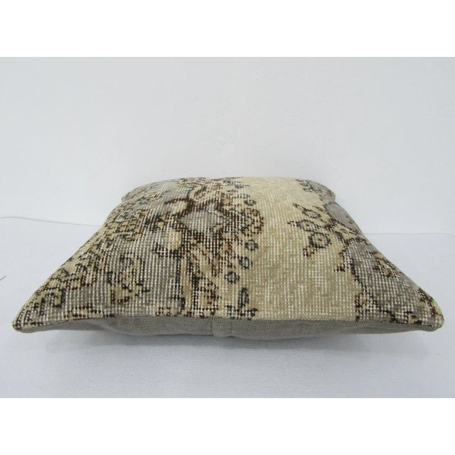 This is a pillow cover made from a vintage kilim rug. The piece was properly washed and ready to use. Pillow inserts not...