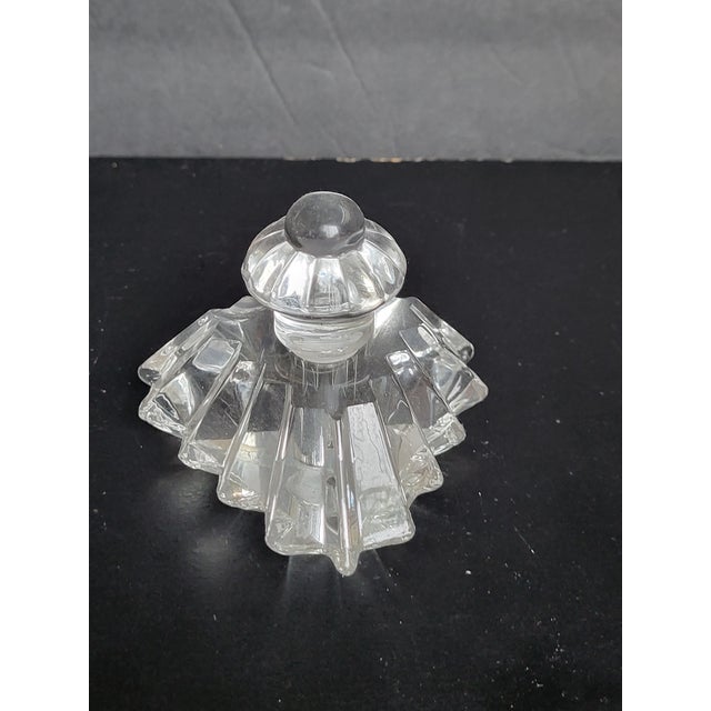 Gorgeous Art Deco lead crystal perfume bottle. Wonderfully detail faceted piece with vanity stopper.