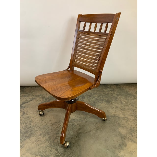 Vintage MidCentury Modern Cane Back Rolling Swivel Bankers Chair