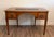 Elegant French Louis XVI Directoire style writing desk crafted in rich cherry wood with exceptional attention to detail....