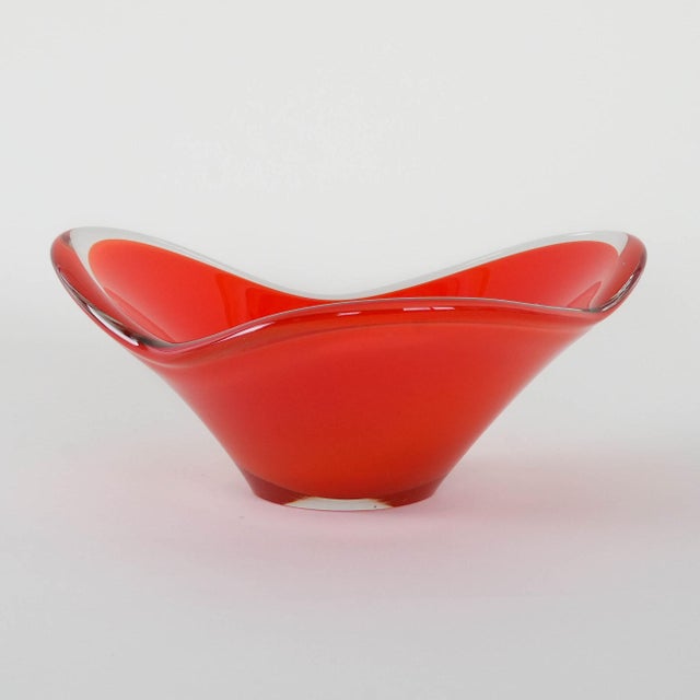Artistic Murano platter manufactured in the 1960s, Italian production. A stunning, hand-formed sommerso platter made of...