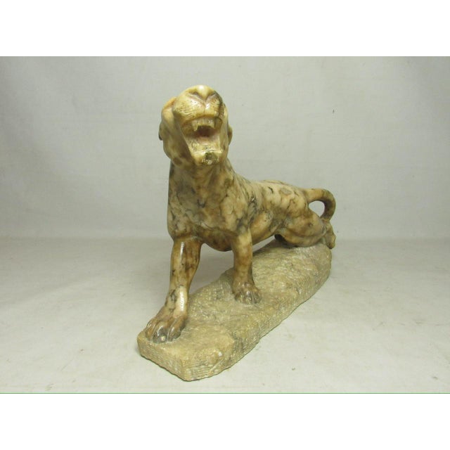 Grand tour Italian carved marble lion, c.1870 A majestic carved lion out of one piece of marble, ready to pounce and...