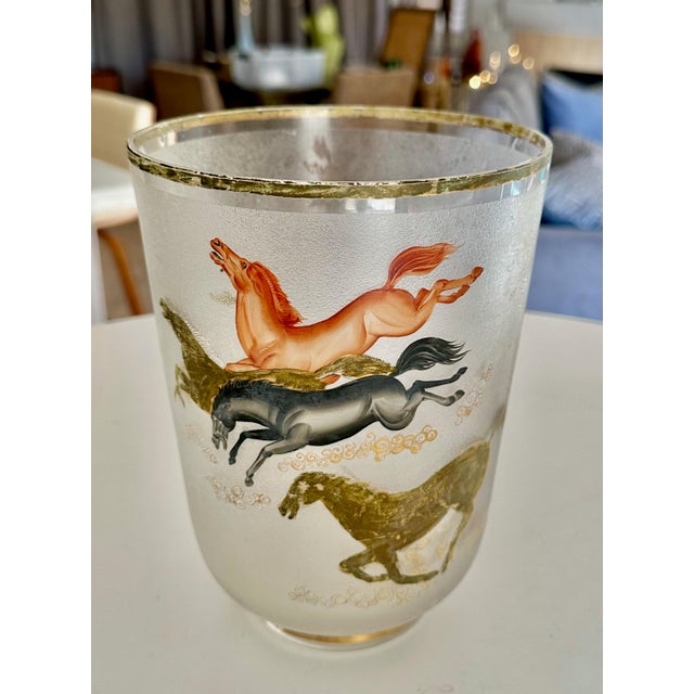 Mid-century modern Culver "Wild Horses" or "Ming" pattern ice bucket. The glass features a smokey, frosted finish with 22K...