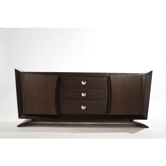 Dresser or sideboard executed in mahogany manufactured by Brown Saltman, circa 1950-1959. Compltely restored, featuring...