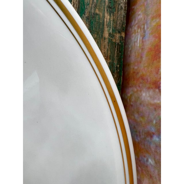 This sumptuous fine porcelain dish from the Meissen factory, dating from the second half of the 19th century, features a...