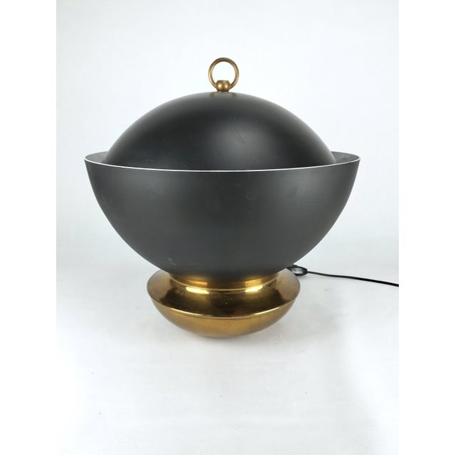 A rare and large Italian designer lamp with a unique character from the 1950s, distinguished by its indirect lighting...