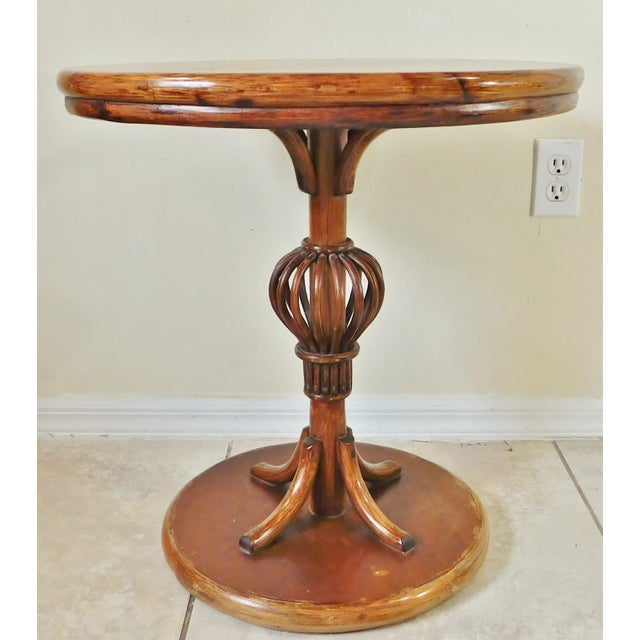 Wonderful vintage circa 1980s ornate round bamboo rattan accent side table with Formica top. Great design. Formica top is...