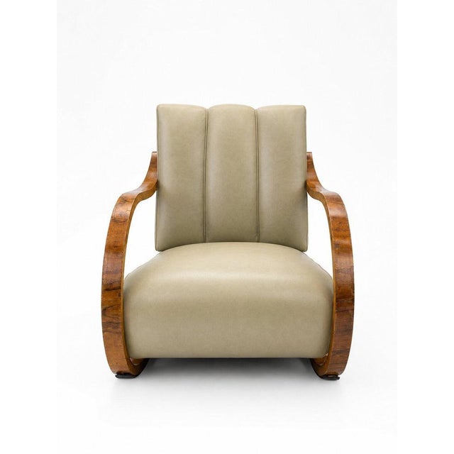 A distinctive Swedish Art Deco rocking chair from the 1930s, featuring its original leather upholstery in remarkably well-...