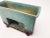 This 1054-8 Roseville Mid Century Modern planter is a stunning piece as far as pottery goes. The desirable green is of the...