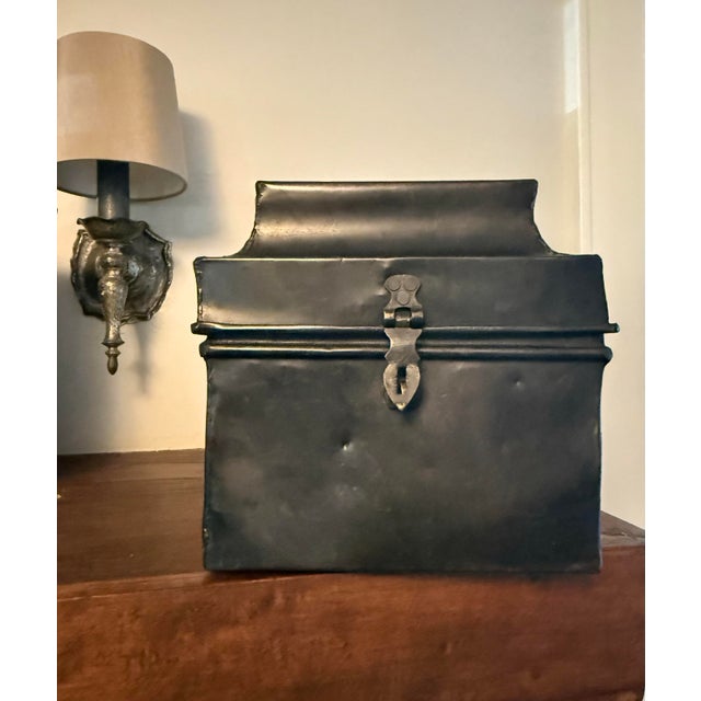 Hot oiled blackened iron and steel yielding a rich dark bronzed black rust-free finish. This mid 19th-century iron Luxury...