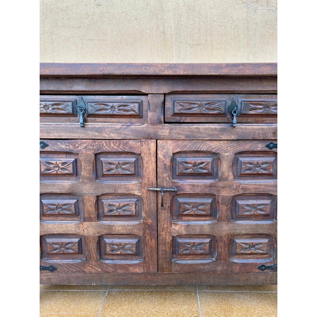 1940s Spanish Rustic Carved Solid Wood Sideboard with Wrought Iron Details For Sale - Image 4 of 9