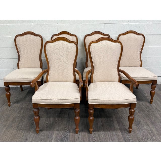 This is a stunning set of six vintage Stanley Furniture French Louis Provincial dining chairs, including two armchairs and...