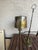 Here is a mid century 1970 period toleware lamp that is in great condition. Base is weighted and the bronze metal is...